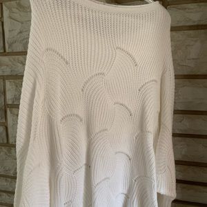 White sweater size L.  No tags. Like new only worn once it's too big for me.